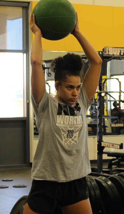 Katelyn Kennedy workout with medicine ball at pre-season conditioning