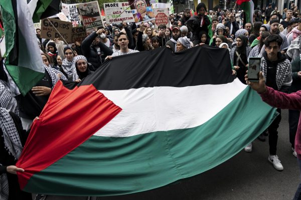 A Pro Palestine protest of people protesting against Israels violent acts against Gaza in Melbourne Australia.