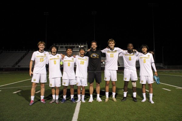 The Boys Varsity Seniors with Cody Fitch after the last regular season game against Heights. 