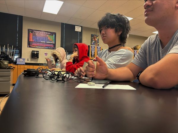 Han Nguyen (10), Clay Magana (10), Chris Nguyen (12) and Dominic Torres (12) participate in a recent scholars bowl practice.