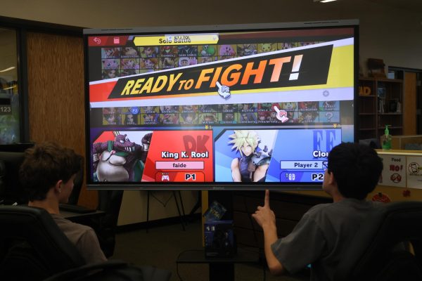 Students getting ready to play a tournament of Smash Bro's
